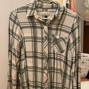 Green and cream light plaid shirt.